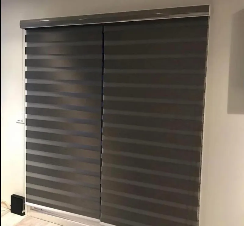 Charcoal zebra blinds on a patio door